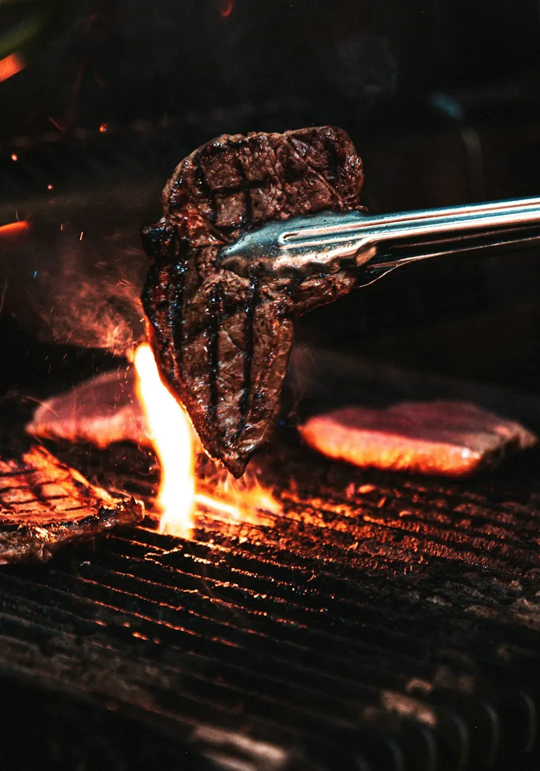 2. Hovering around the grill and giving unsolicited advice (Image Credits: Unsplash)