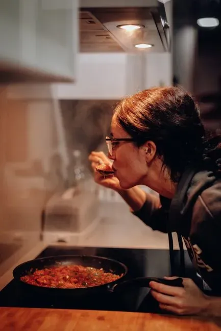 1. Salting your food before tasting it (Image Credits: Pexels)