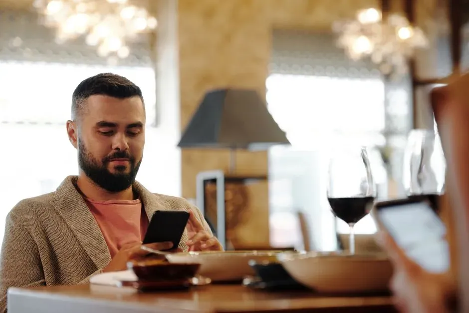 5. Whether you're on your phone before you even reach the stand (Image Credits: Pexels)