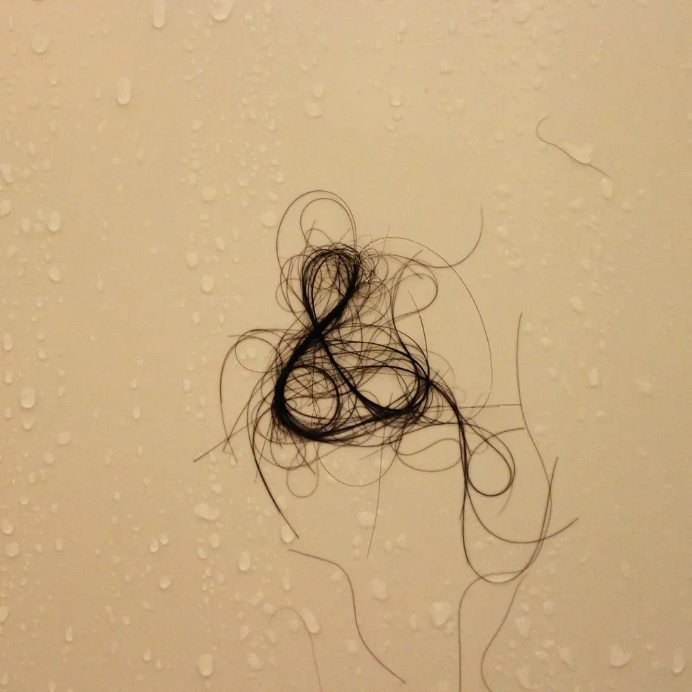 2. Letting Hair Go Down the Shower or Bathroom Drain (viviandnguyen_, Flickr, <a href="https://creativecommons.org/licenses/by-sa/2.0/" target="_blank" rel="noopener">CC BY-SA 2.0</a>)