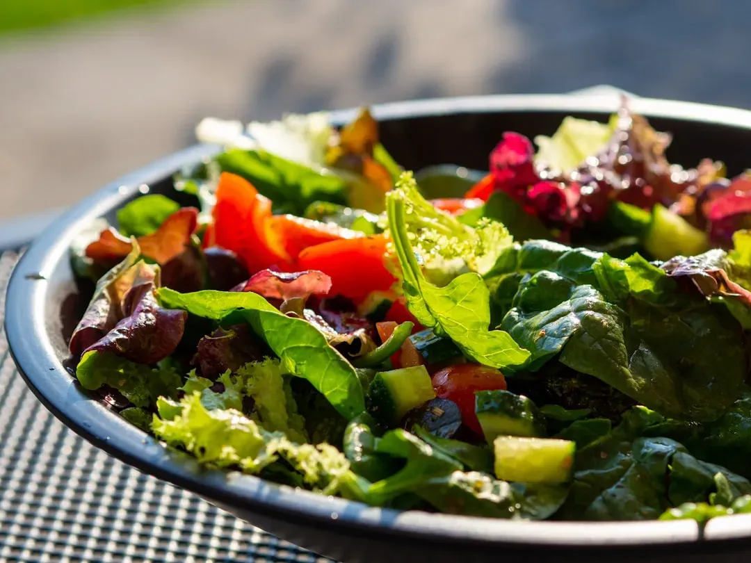 6. Bagged salad greens (Image Credits: Unsplash)