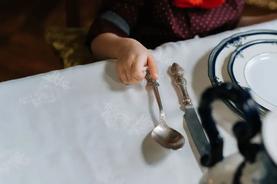 3. How They Hold Their Utensils (Image Credits: Pexels)