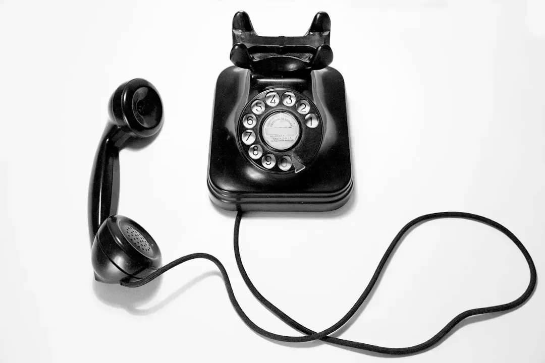 2. Answering the Phone With a Specific Script (Image Credits: Unsplash)