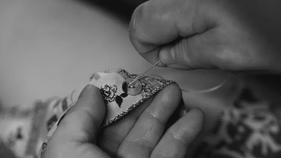 9. Darning socks and mending clothes by hand (Image Credits: Pexels)