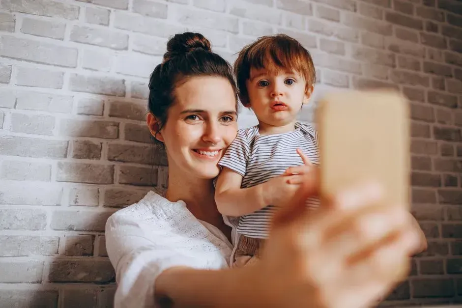 Sharenting every milestone online (Image Credits: Pexels)
