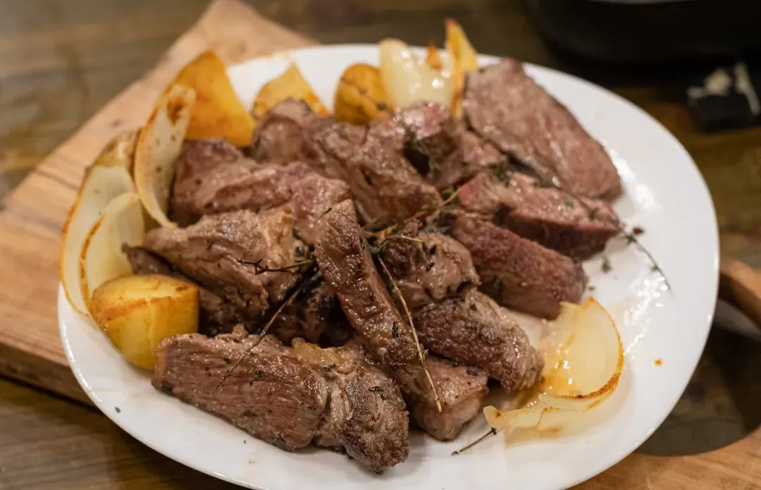 2. Liver and Onions (Image Credits: Unsplash)