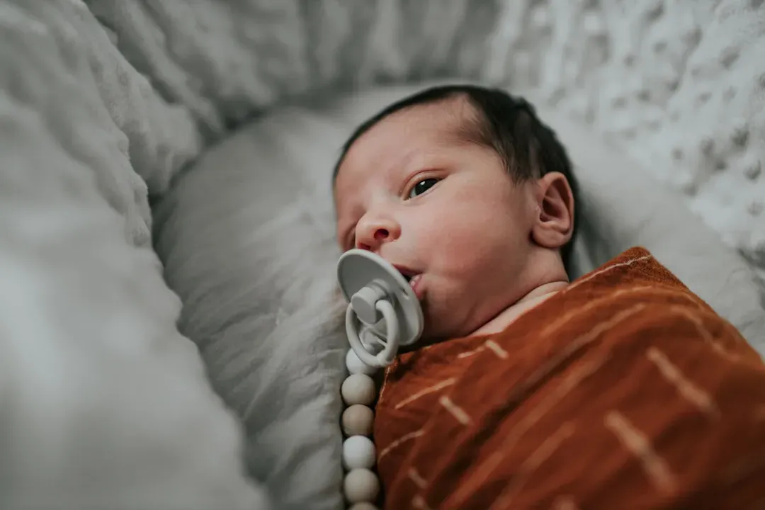 Reaching for weighted swaddles and sleep sacks (Image Credits: Unsplash)