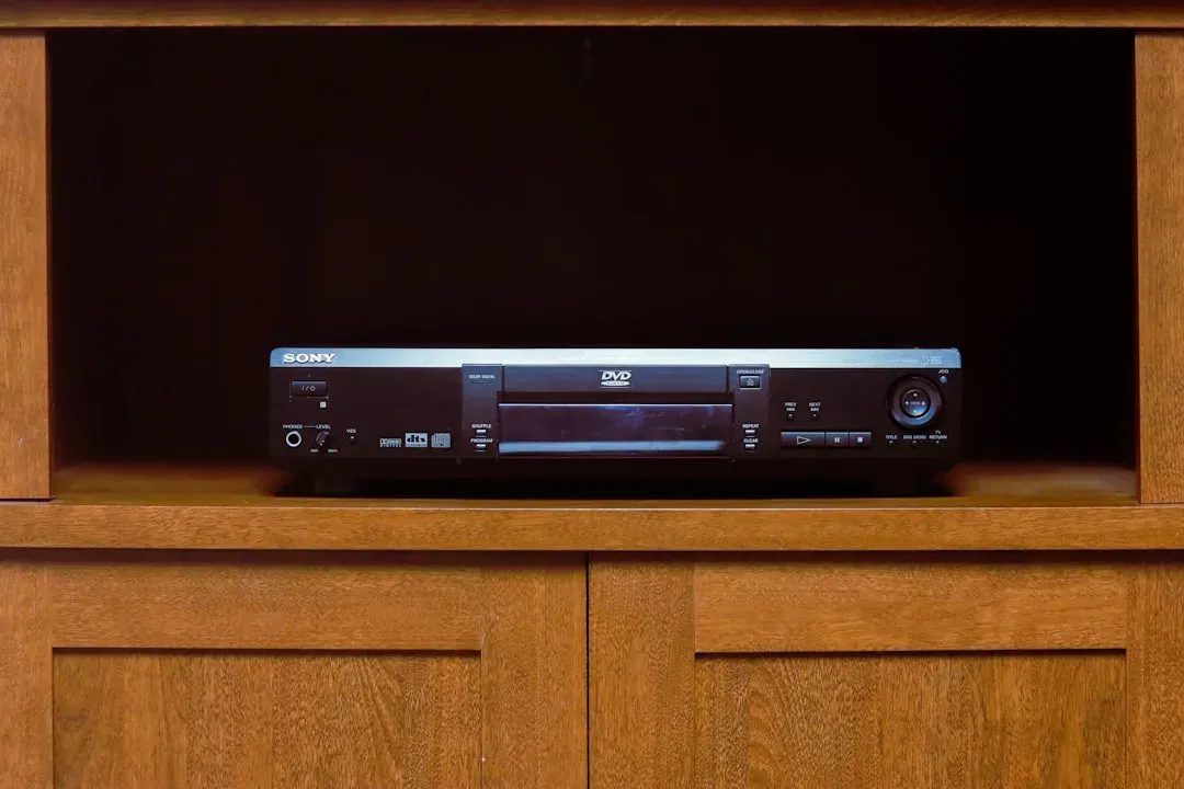 4. The Oversized Wooden Entertainment Center (Image Credits: Unsplash)