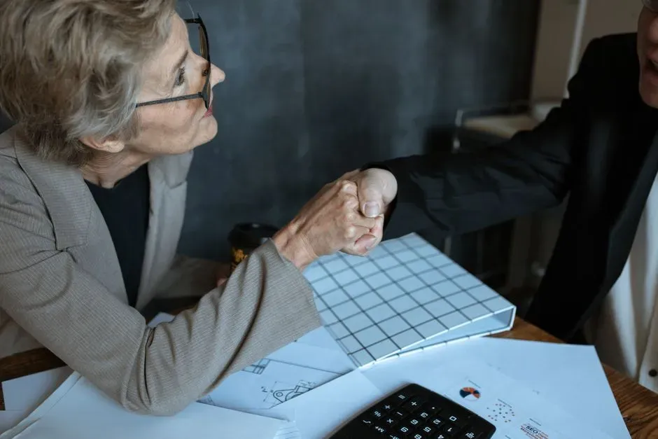 7. Negotiating in person (Image Credits: Pexels)