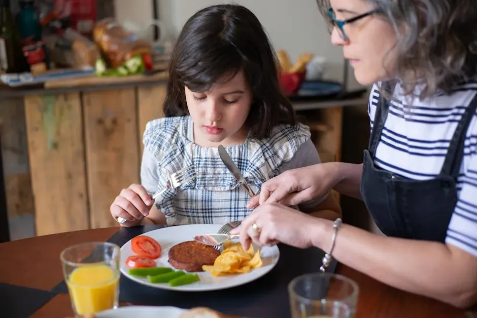 4. Teaching Table Manners (Image Credits: Pexels)