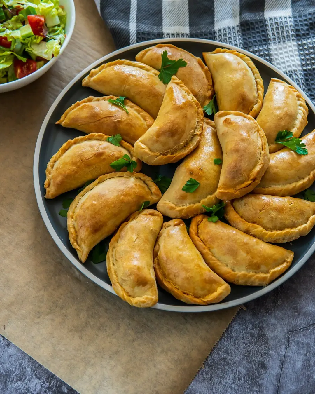 Empanadas move from party trays to weekly dinners (Image Credits: Unsplash)