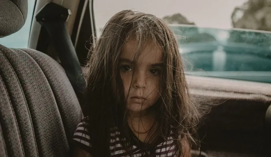 2. Riding in cars without car seats or seatbelts (Image Credits: Pexels)