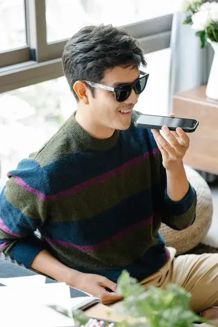 4. Talking on Speakerphone in Shared Spaces (Image Credits: Gallery Image)