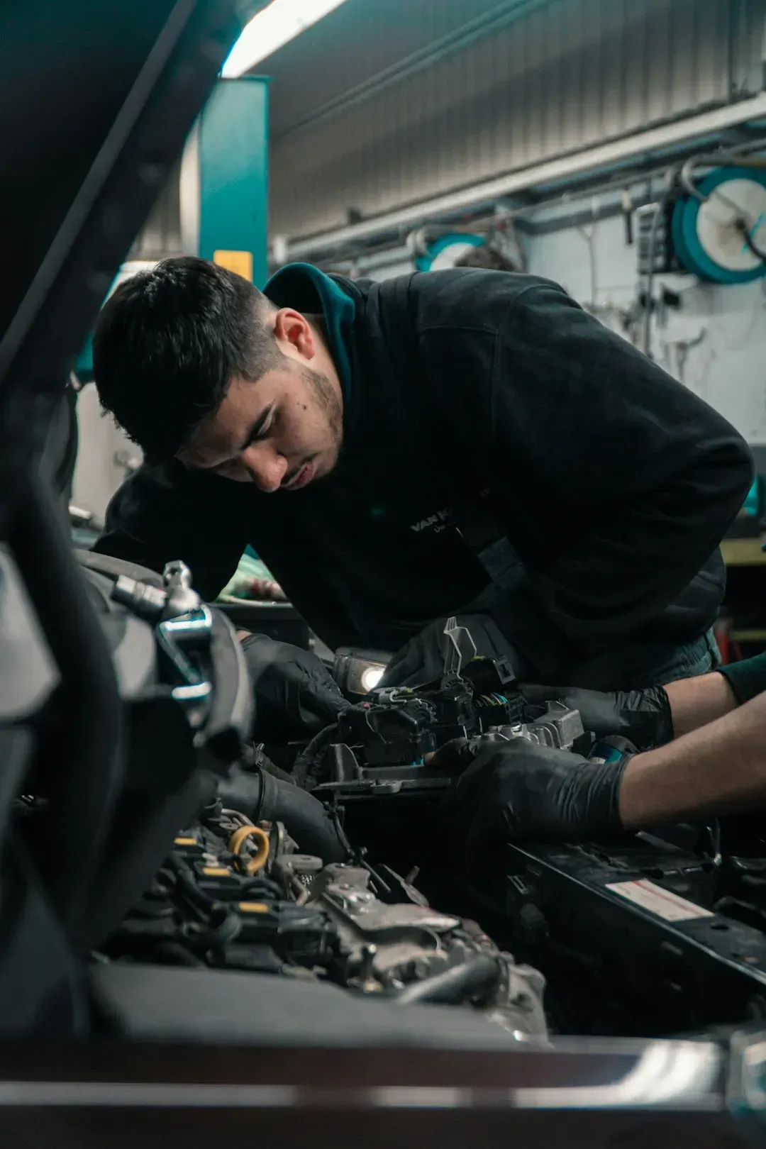 9. Basic car maintenance (Image Credits: Unsplash)