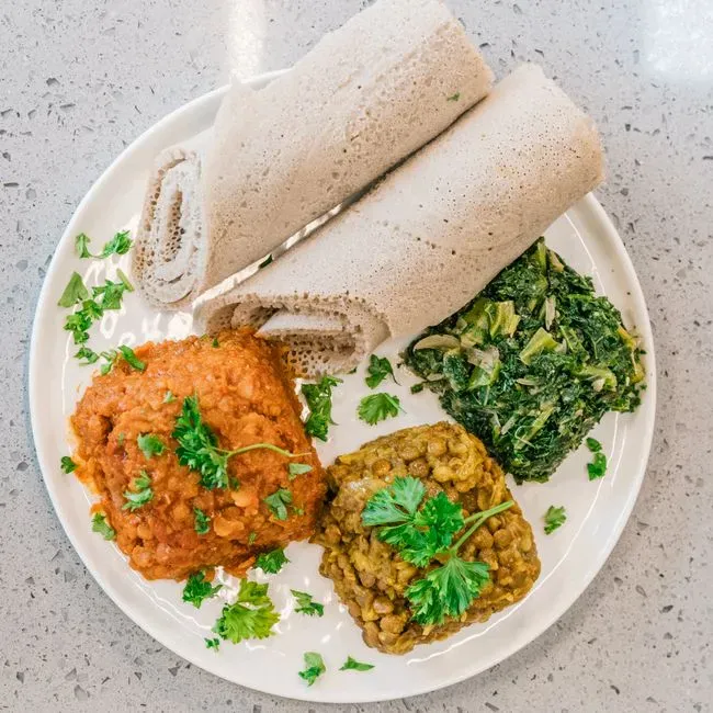 1. The Ethiopian Gursha: Feeding Someone with Your Hands (Image Credits: Pexels)