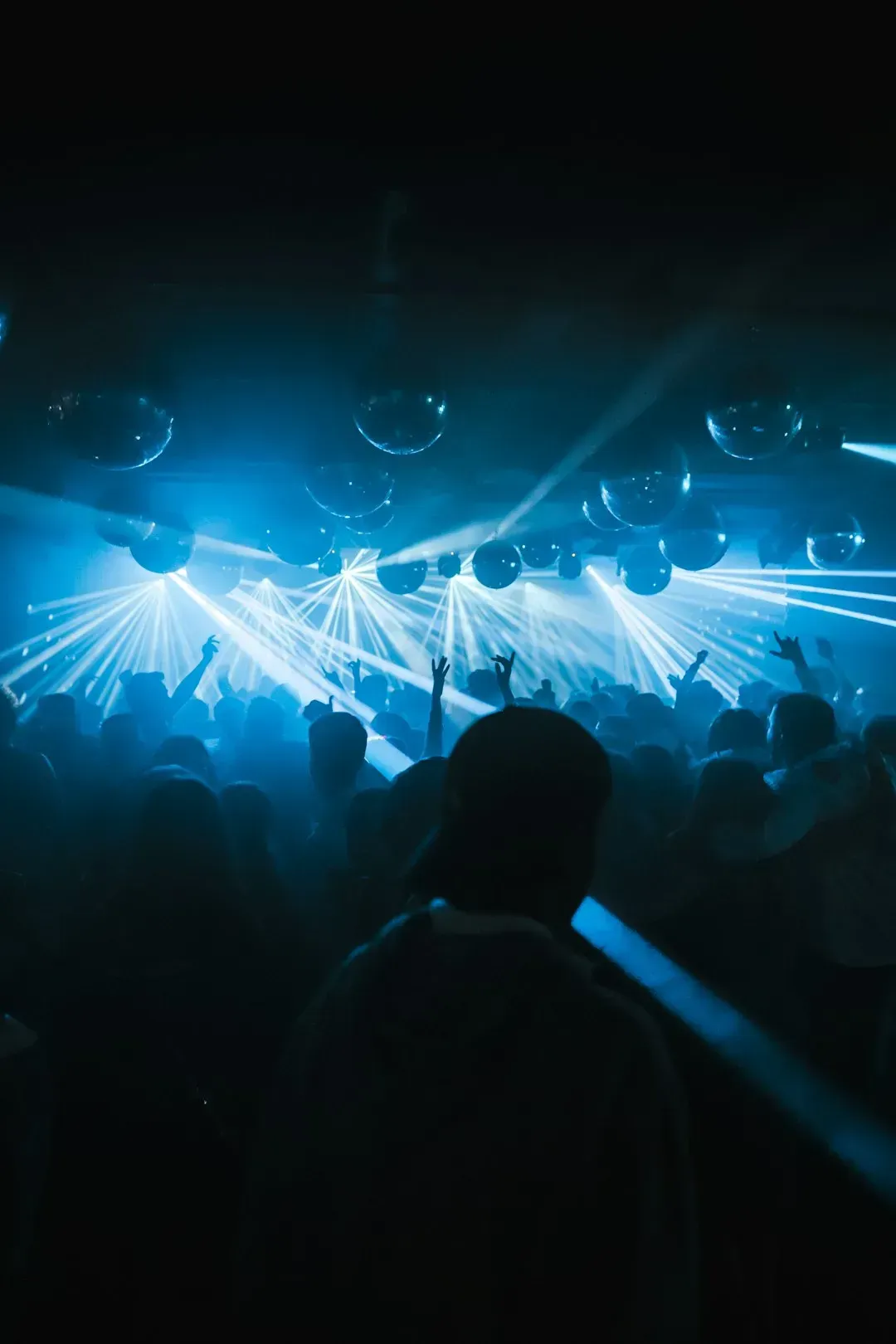 Packed nightclubs and late night bars (Image Credits: Unsplash)