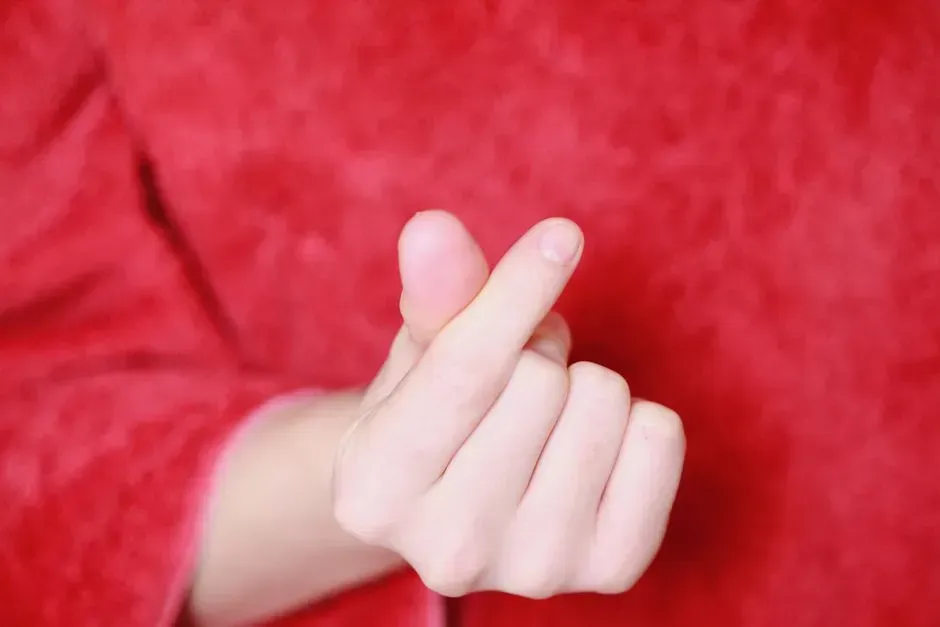 Snapping fingers or waving aggressively to get attention (Image Credits: Pexels)