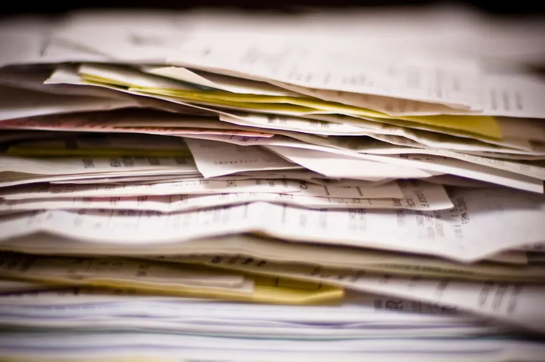5. Stacks of Physical Paper and Documents (Image Credits: Unsplash)