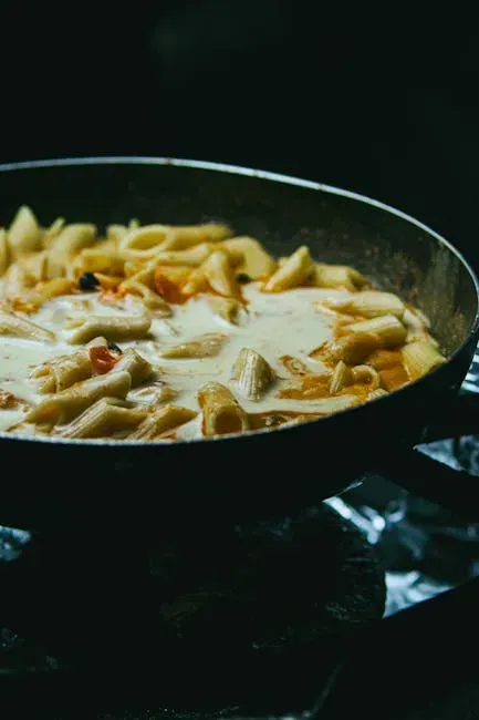 5. Finishing Pasta Directly in the Sauce (Image Credits: Pexels)