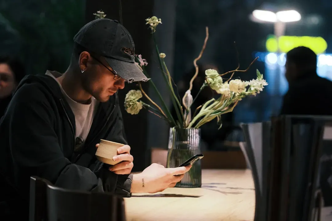 Talking on the phone through most of the interaction (Image Credits: Unsplash)