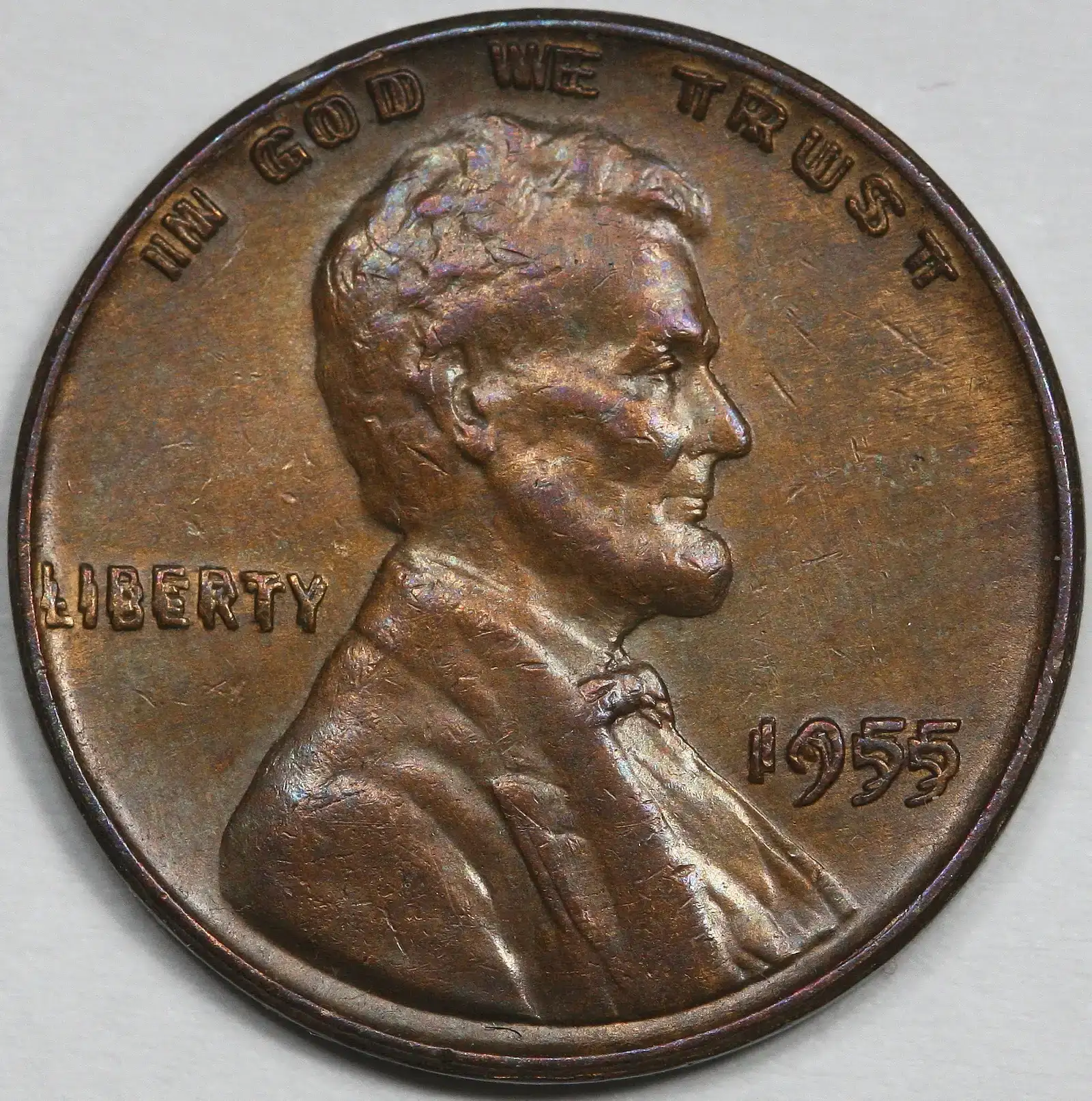 The 1955 Doubled Die Obverse Lincoln Cent (Image Credits: By Lost Dutchman Rare Coins for image, Victor David Brenner for coin, <a href="https://commons.wikimedia.org/w/index.php?curid=32346893" target="_blank" rel="noopener">Public domain</a>)