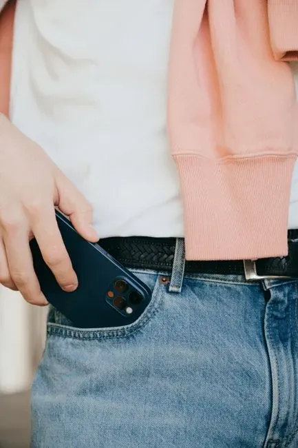 10. Whether his phone stays in his pocket (Image Credits: Pexels)