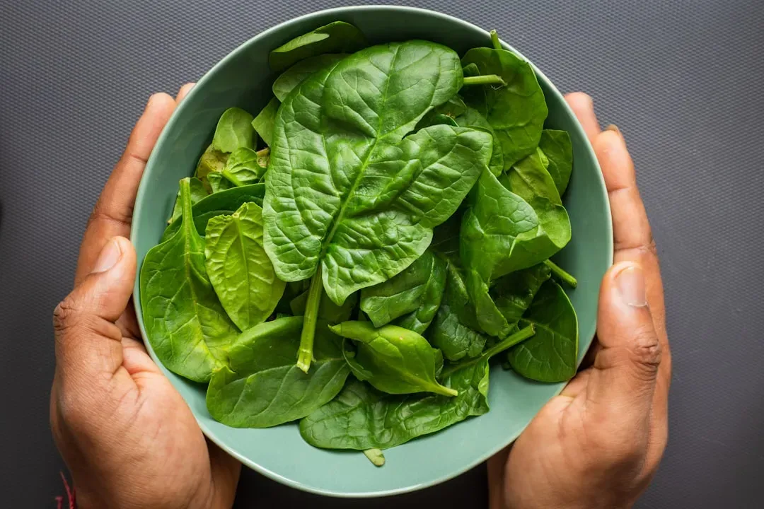 Leafy greens for vitamin K, folate, and iron (Image Credits: Unsplash)