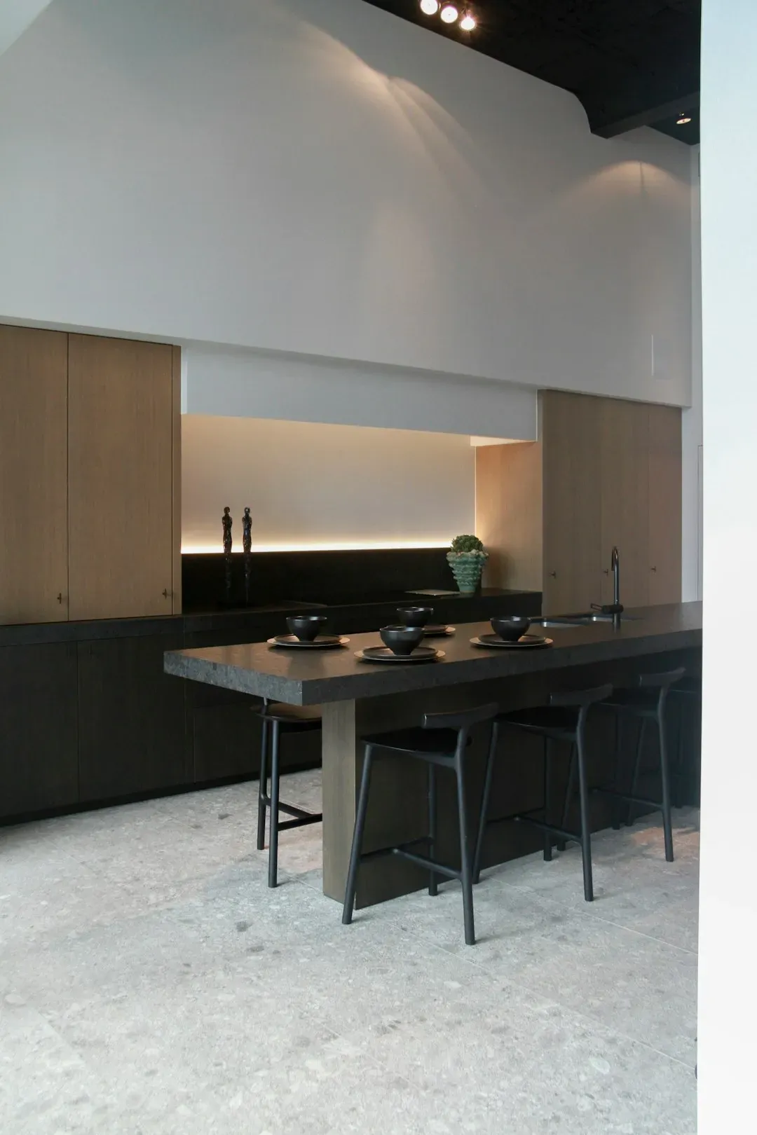 One-wall kitchens stacked floor to ceiling with cabinetry (Image Credits: Unsplash)