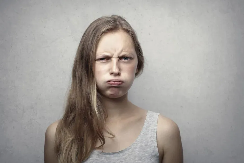 1. The One-Sided Lip Raise: Contempt (Image Credits: Pexels)