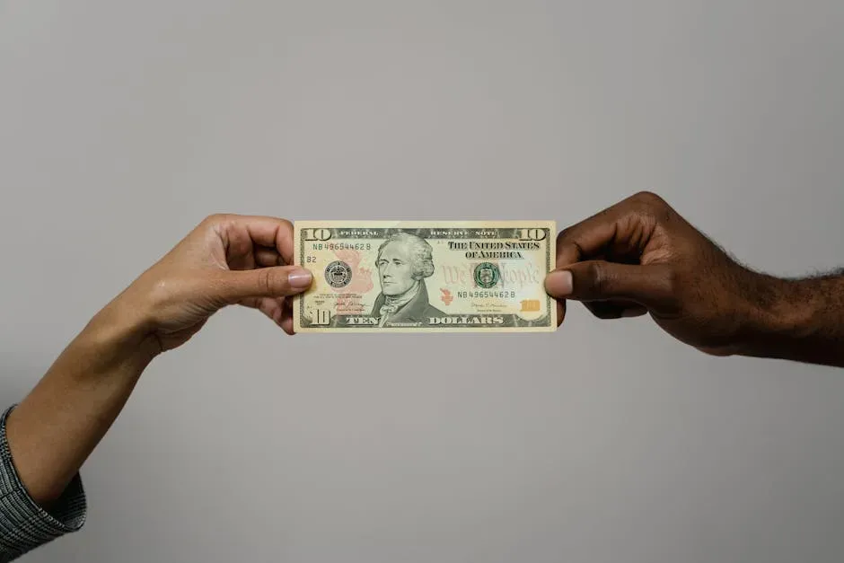 3. The Idea That One Partner Should Carry the Financial Weight (Image Credits: Pexels)