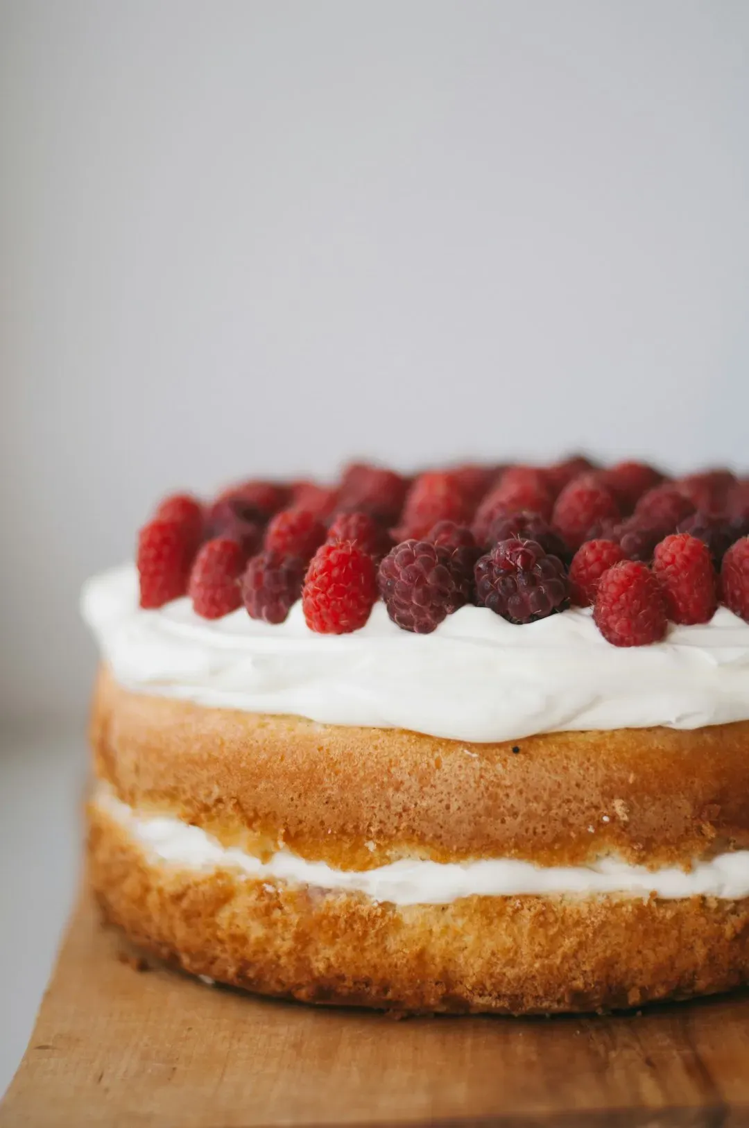 6. Fruit and whipped cream topped cakes (Image Credits: Unsplash)