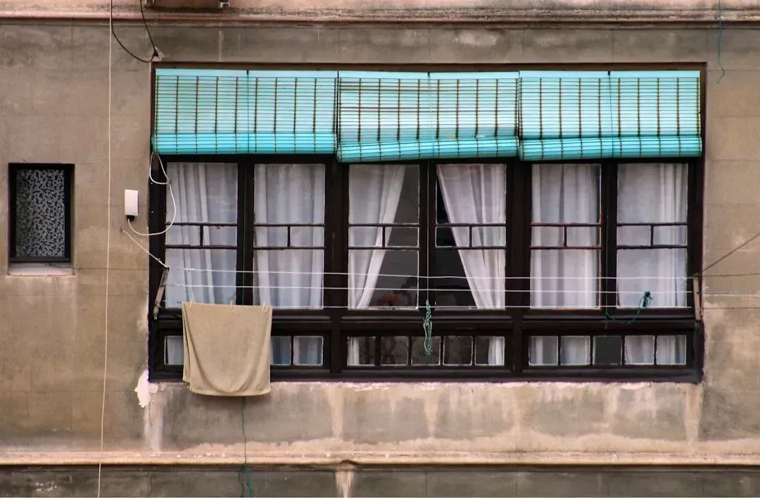 1. Hanging Curtains Too Low and Too Short (Image Credits: Unsplash)