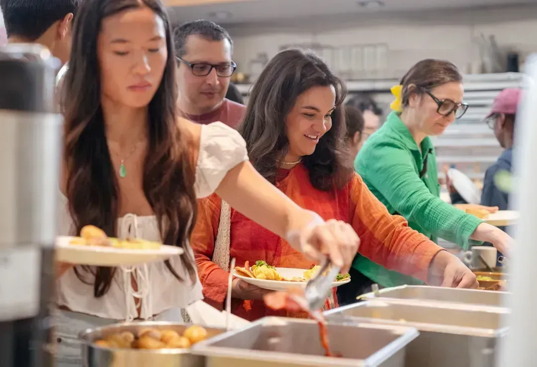 4. Eating or Sampling Food While Standing in Line (Image Credits: Unsplash)