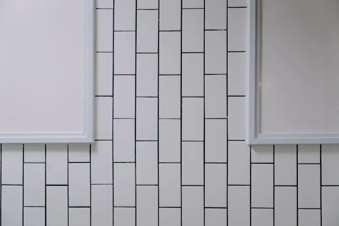4. Install Vertical Tile to Pull the Eye Upward (Image Credits: Unsplash)