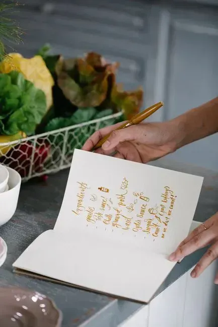 3. Recipe cards and cookbooks with handwritten notes (Image Credits: Pexels)