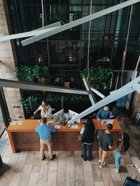 11. Making Loud Speakerphone Calls in the Lobby (Image Credits: Pexels)