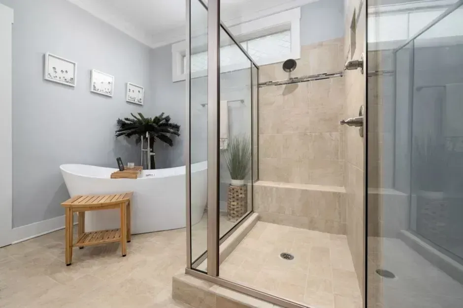 7. Replace a Shower Door With a Glass Panel or Curtain (Image Credits: Pexels)