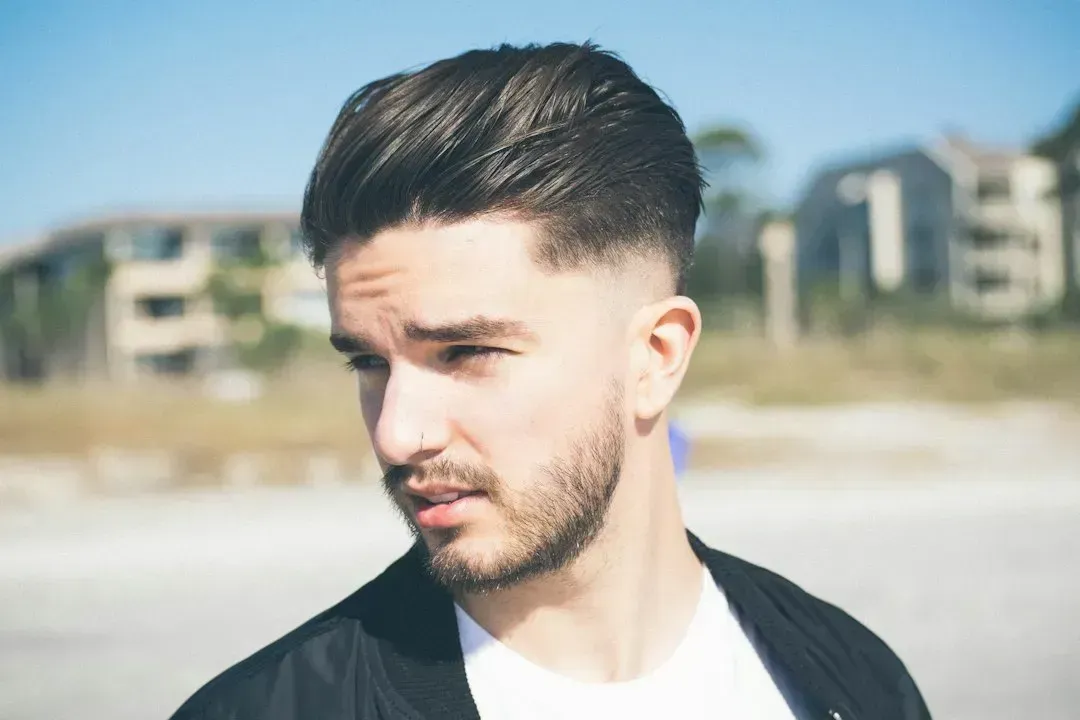 12. Excessive hair gel or overly styled hair (Image Credits: Unsplash)