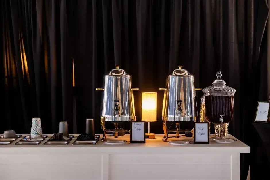 4. Treating the coffee station like a personal refill bar for the room (Image Credits: Pexels)