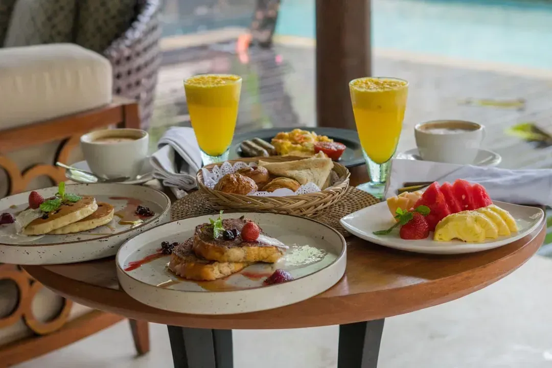 6. Leaving tables littered with dishes and food waste (Image Credits: Unsplash)