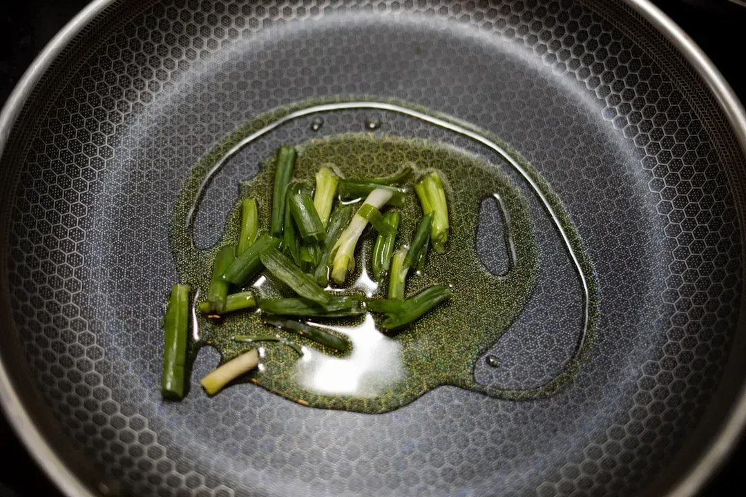 7. Cooking in a cold pan (Image Credits: Unsplash)