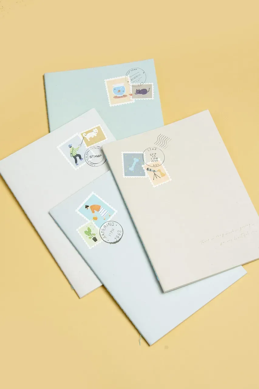 Tucking Small Extras Inside the Envelope (Image Credits: Pixabay)