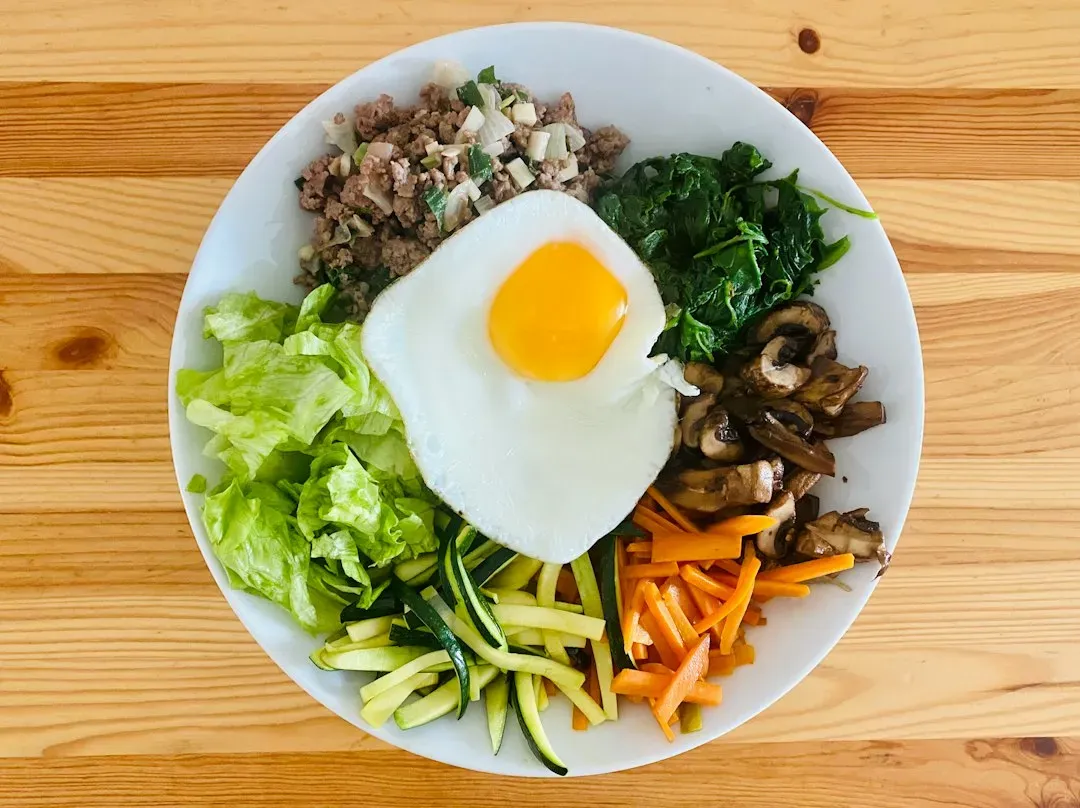 Bibimbap and Korean Side Dishes (Image Credits: Unsplash)