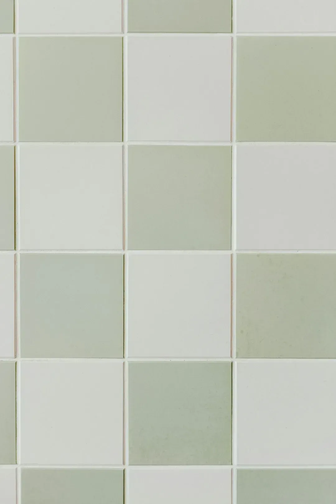 Square and larger format tiles offer a quieter alternative (Image Credits: Unsplash)
