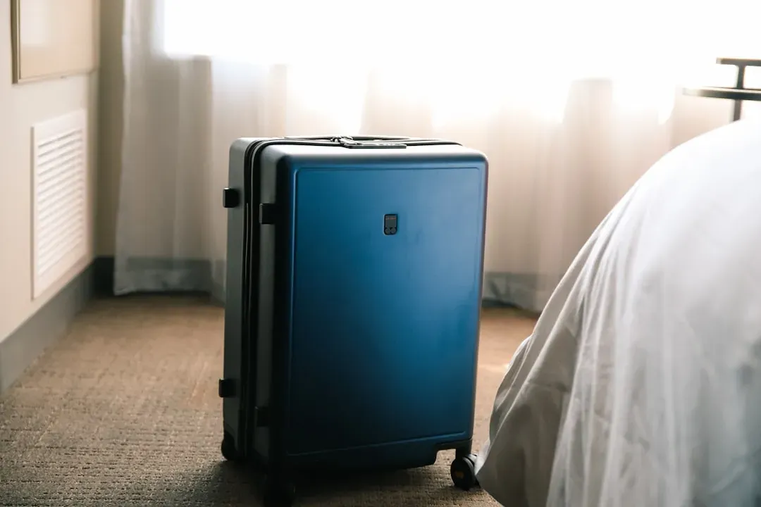 1. They pack like they're moving countries permanently (Image Credits: Unsplash)