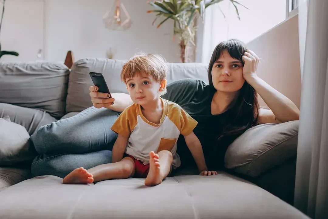 12. Watching the evening news together as a family (Image Credits: Unsplash)