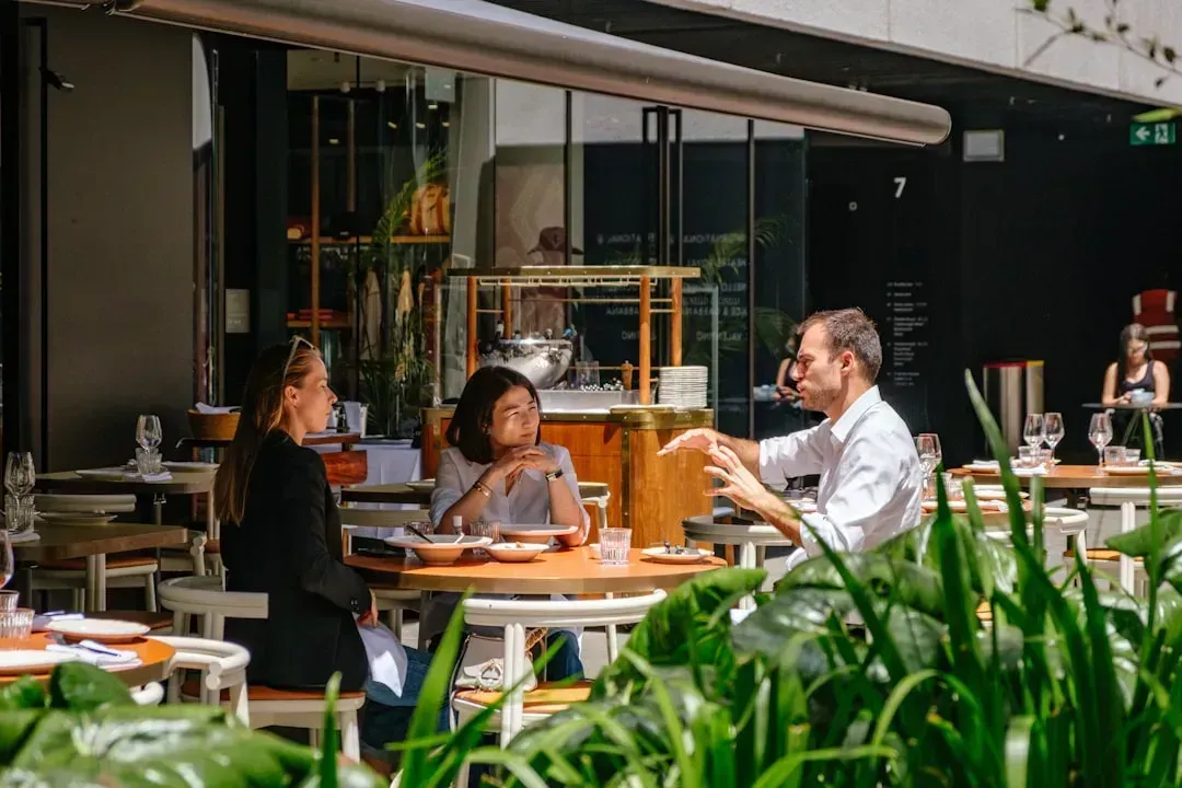 6. Who You're Dining With (Image Credits: Unsplash)