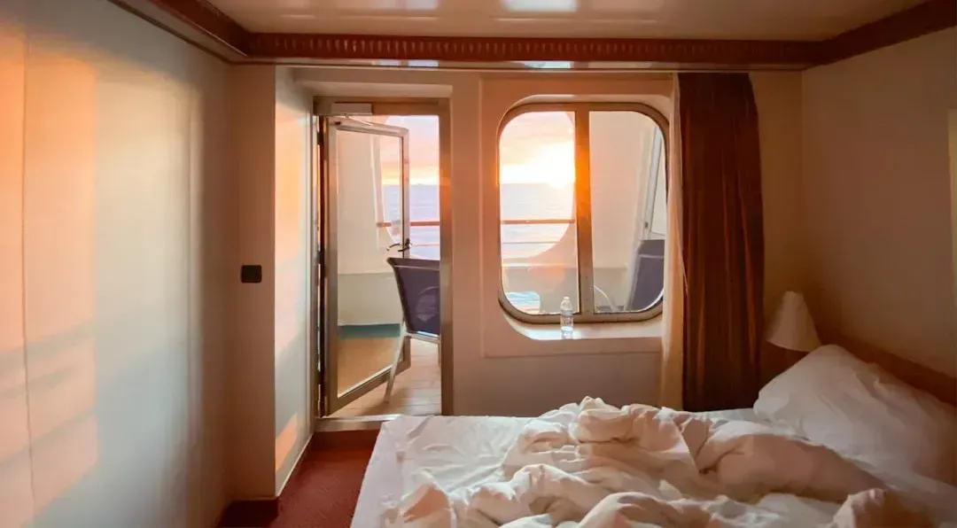 4. Discreet cabin credit and mini bar touches (Image Credits: Unsplash)