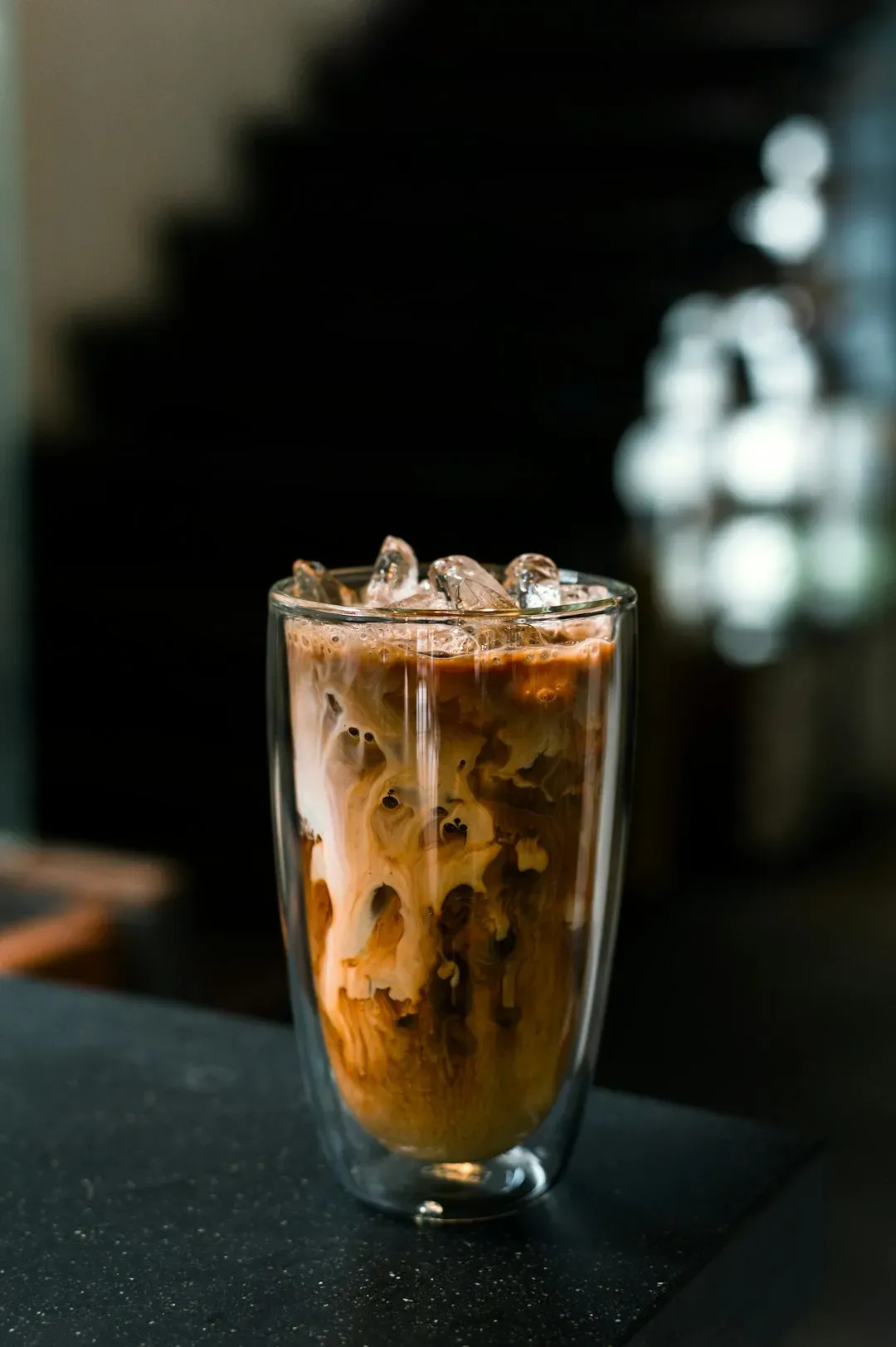 6. Requesting "Light Ice" and Expecting More Coffee (Image Credits: Unsplash)