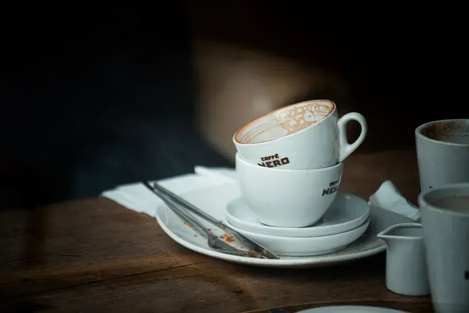 9. Stacking your own dirty dishes to "help" (Image Credits: Pexels)